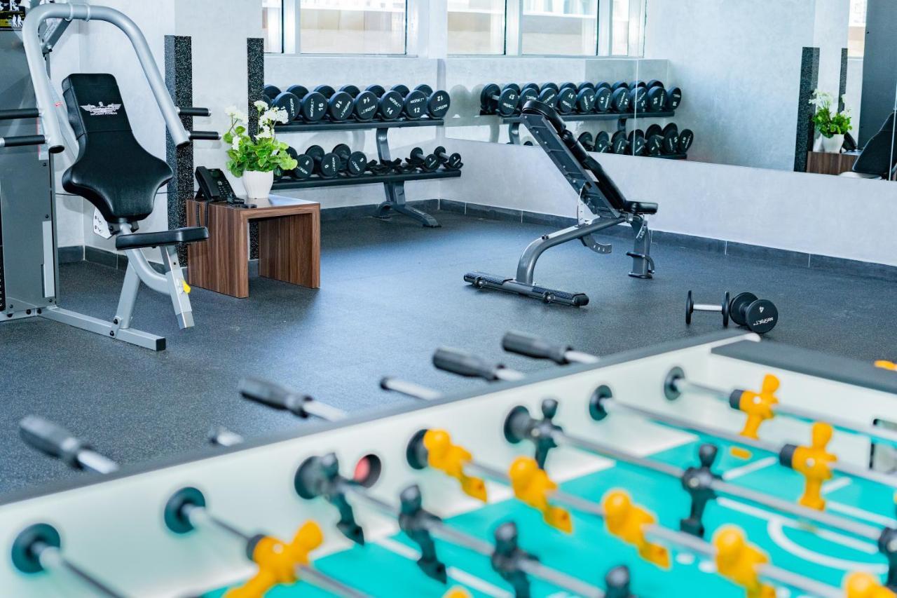 Luxe Grand Hotel Apartments Schardscha Exterior foto The gym at the hotel